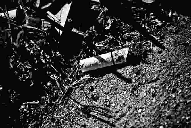 A Black And White Photograph Of A Discarded, Broken Object Lying On The Ground, Revealing Intricate Details And Patterns. Lovely Things In Ugly Places