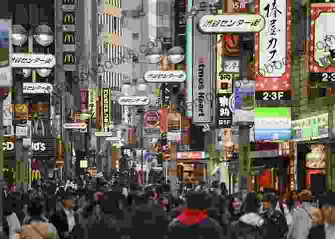 A Bustling Street In Tokyo, Japan, With People Walking And Shopping How To Travel Safely In Japan