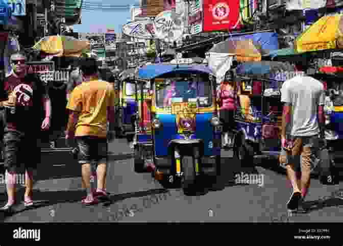 A Bustling Street Scene In Bangkok, Thailand, With Tuk Tuks, Vendors, And Pedestrians 3 Days In Bangkok Chris Backe