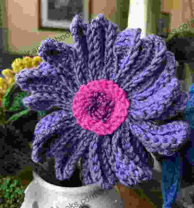 A Close Up Of A Beautiful Knitted Flower In Full Bloom, With Delicate Petals And Intricate Details Knitted Spiral Flower Knitting Tutorial: How To Make Cute And Simple Knit Flower: Simple Flowers Knitting Patterns