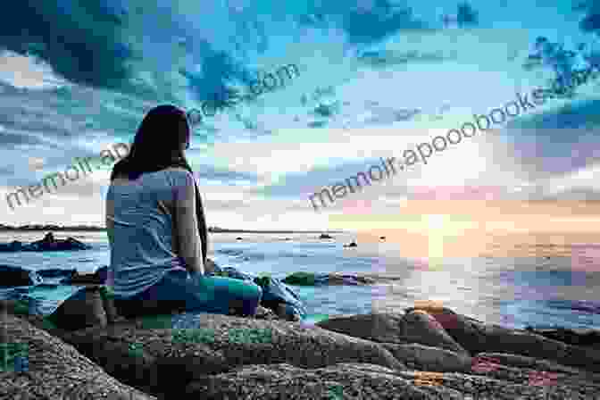 A Person Sitting Alone On A Beach, Staring Out At The Ocean. From The Pink Sands: A Poetry Chapbook