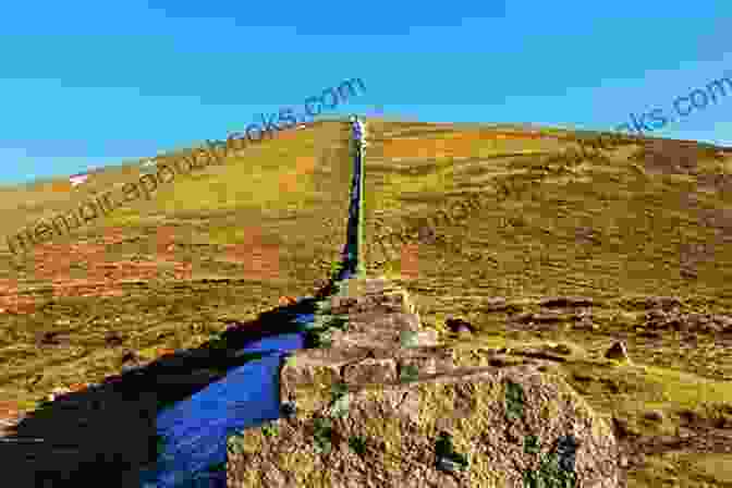 Hikers Taking In The Breathtaking Panorama From The Summit Of Slieve Donard, The Highest Peak In Northern Ireland The Mourne And Cooley Mountains: A Walking Guide