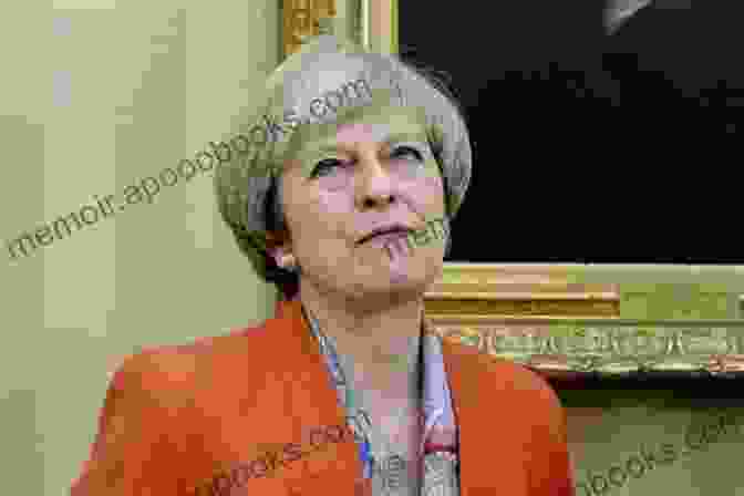 Theresa May, Looking Concerned And Thoughtful, Standing In Front Of A Union Jack Flag Theresa May: The Enigmatic Prime Minister